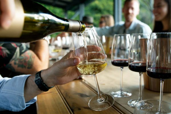 Customers Enjoying Wine at Bar