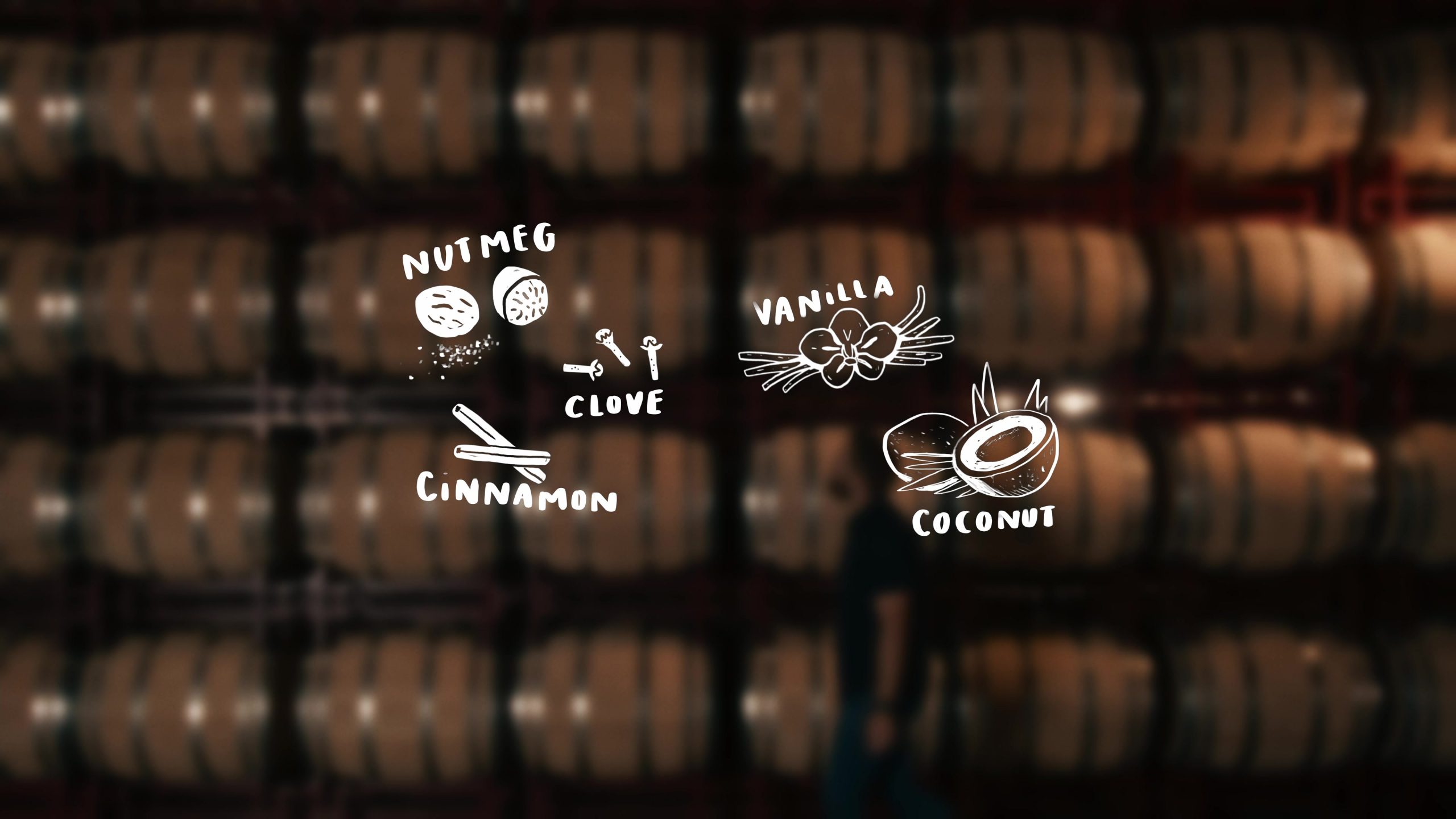 Wooden barrels with illustrated spice and flavor labels including nutmeg, clove, cinnamon, vanilla, and coconut.